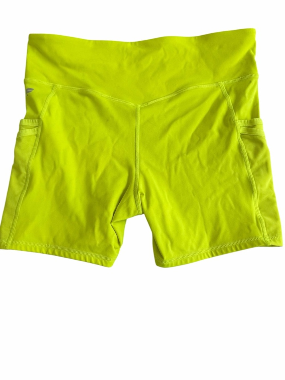 Fabletics activewear shorts in a vibrant neon lime (004)